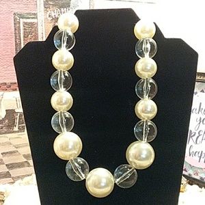 Faux pearl necklace with clear acrylic beads